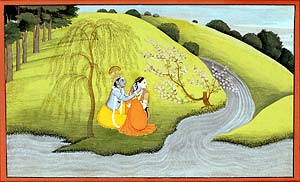 Radha makes love to Krishna in the grove